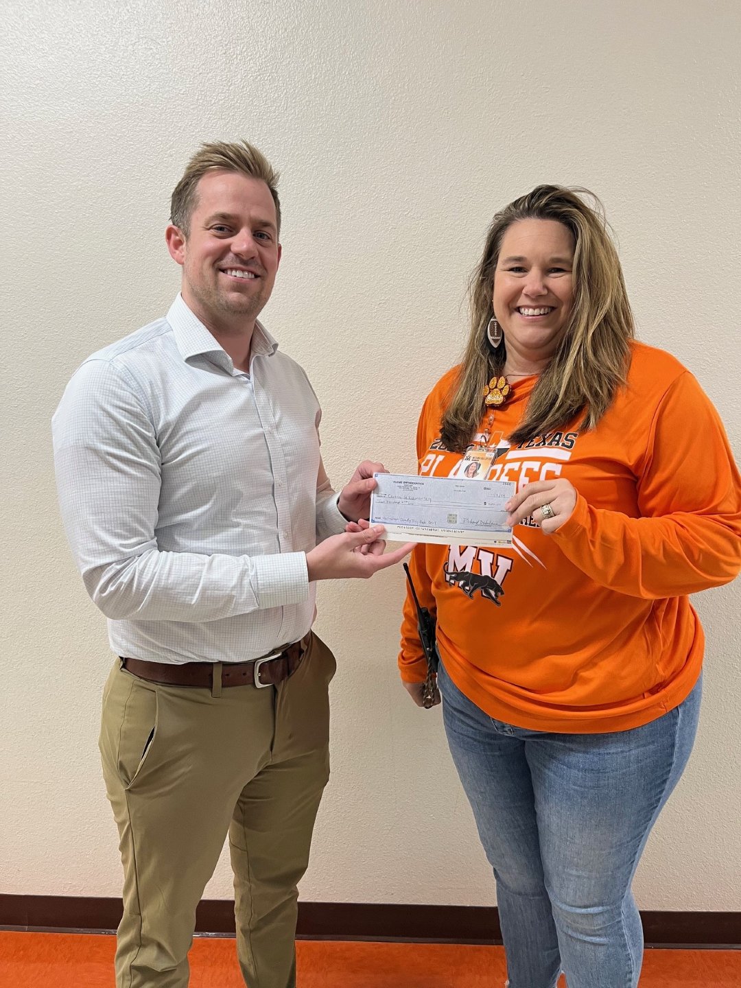 Dr. Ray with a patient of Hulme Orthodontics in San Antonio, TX